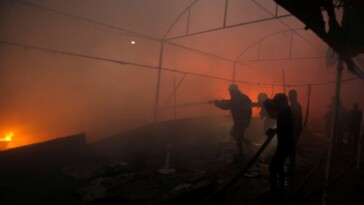 israeli-strike-on-hospital-tent-camp-kills-4-and-ignites-a-fire-that-burns-dozens