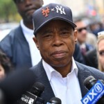 new-york-city-mayor-eric-adams-roasted-for-wearing-both-yankees,-mets-logos-on-hat