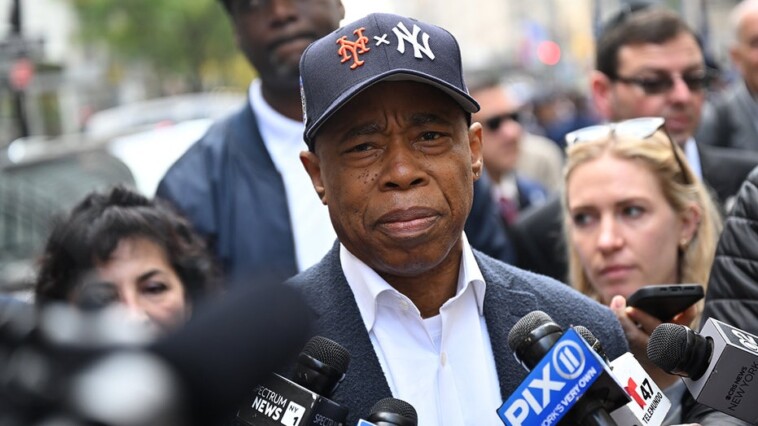 new-york-city-mayor-eric-adams-roasted-for-wearing-both-yankees,-mets-logos-on-hat