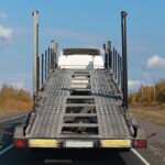 study-finds-100%-of-men-fantasize-about-launching-car-off-every-auto-transport-trailer-they-see