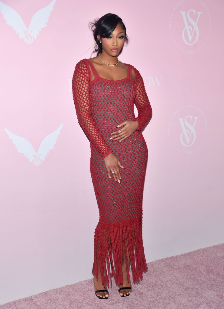 angel-reese-stuns-at-victoria’s-secret-fashion-show-in-vibrant-red-dress