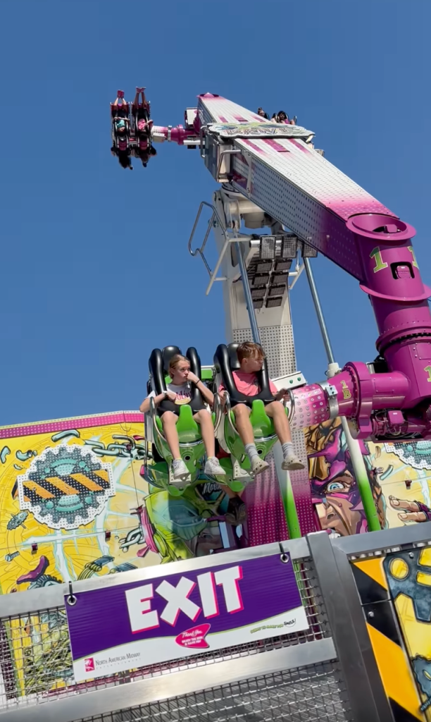 ‘panicking’-mom-watches-as-her-kids-left-dangling-upside-down-for-15-minutes-in-air-after-state-fair-ride-malfunction