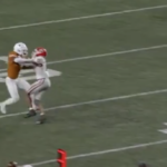 officials-reverse-controversial-texas-pass-interference-call-during-delay-for-fans-throwing-objects-onto-the-field