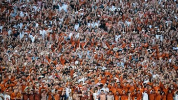 texas-fans-launch-beer-cans,-other-debris-onto-field-after-questionable-call