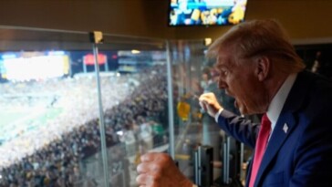 watch:-fan-with-pro-trump-sign-runs-onto-the-field-during-sunday-night-football