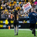 woman-runs-onto-steelers’-field-with-pro-trump-sign-as-former-president-attends-game