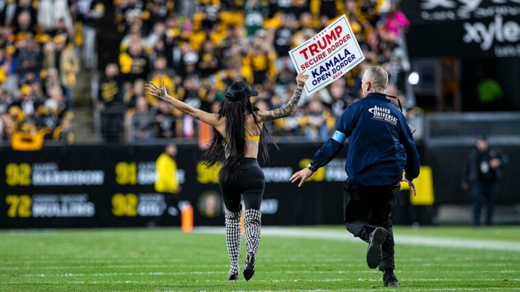 woman-runs-onto-steelers’-field-with-pro-trump-sign-as-former-president-attends-game