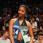 angel-reese-sits-courtside-at-wnba-finals-with-split-lynx/liberty-outfit