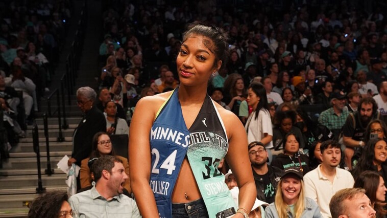 angel-reese-sits-courtside-at-wnba-finals-with-split-lynx/liberty-outfit