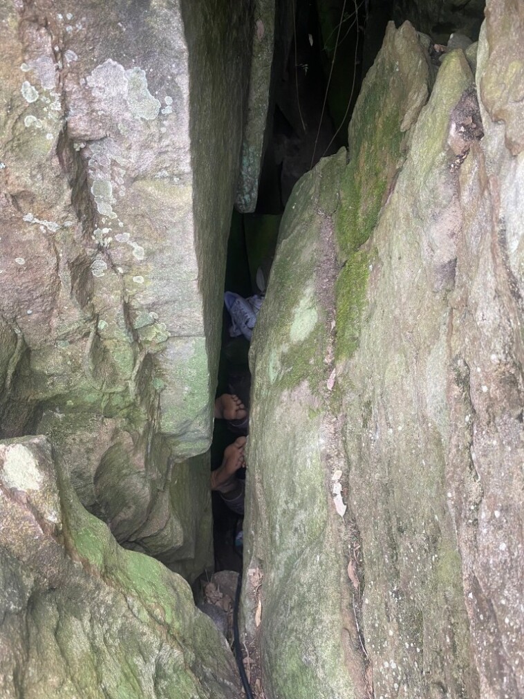 australian-woman-stuck-upside-down-between-boulders-for-seven-hours-after-trying-to-retrieve-phone