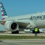 wild-video-shows-american-airlines-plane-sucking-cargo-container-into-engine