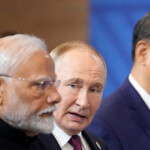 brics-summit,-day-2:-putin-scores-by-embracing-xi-and-modi