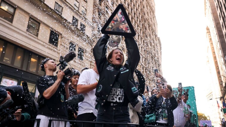 liberty-celebrate-title-with-ticker-tape-parade