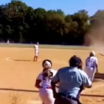 virginia-softball-player-contends-with-dust-devil-as-she-makes-diving-play-for-out