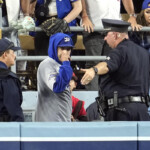 world-series:-fan-interference-ruling-at-dodger-stadium-keeps-yankees-scoreless-on-pivotal-play