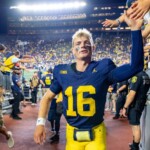 source:-u-m-goes-back-to-warren-as-starting-qb