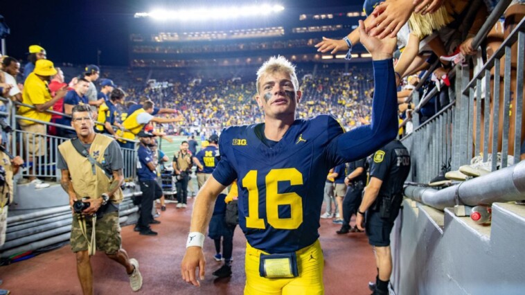 source:-u-m-goes-back-to-warren-as-starting-qb