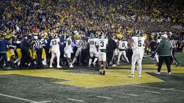 punches-thrown-as-michigan-beats-michigan-st.