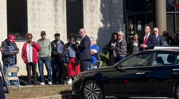 a-clueless-joe-biden-waits-in-line-to-vote-behind-guy-wearing-pro-trump-hat-with-special-message-to-voters-(video)