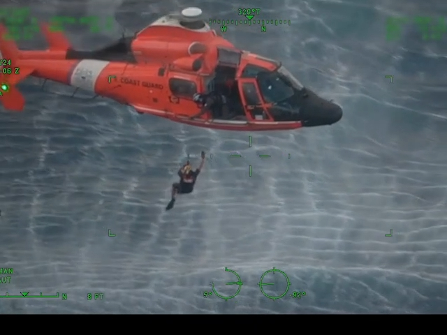 us-coast-guard-saves-father-and-sons-clinging-to-capsized-boat-in-hawaii