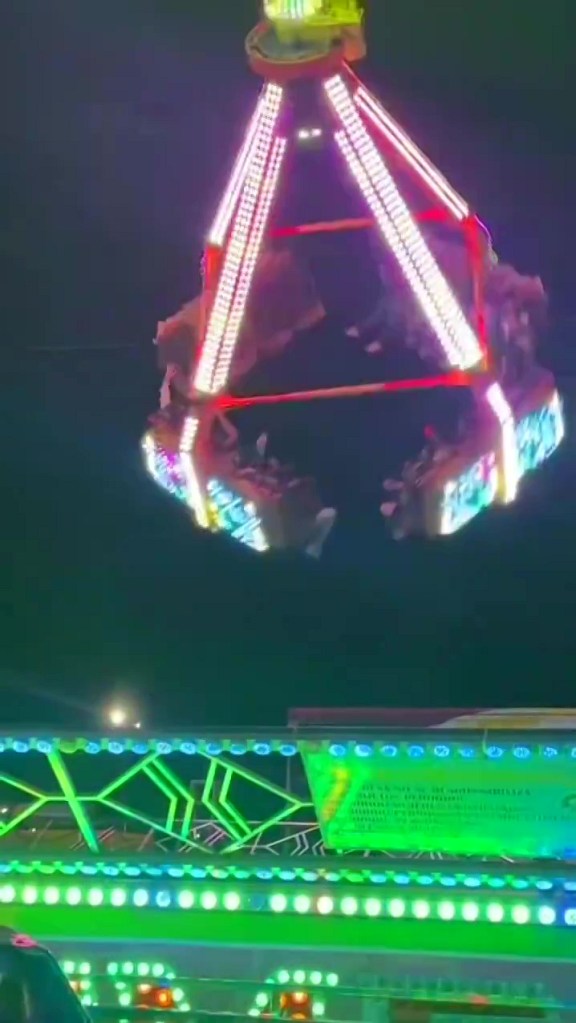 terrifying-video-shows-the-moment-vehicles-detach-from-carnival-ride,-critically-injuring-six