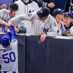 two-fans-ejected-for-prying-ball-from-betts’-glove