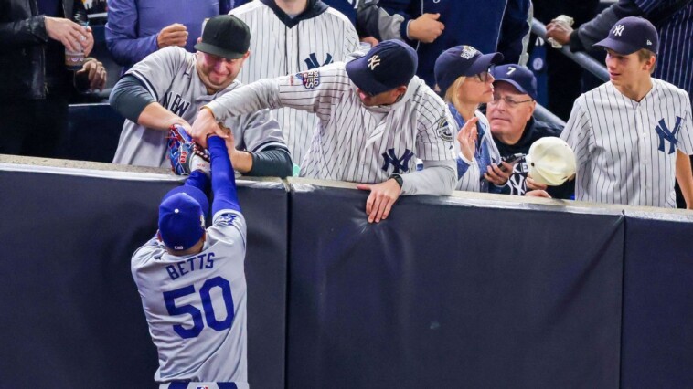 two-fans-ejected-for-prying-ball-from-betts’-glove