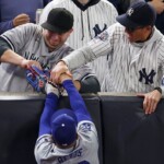 john-sterling,-suzyn-waldman-can’t-believe-yankees-fans-interfered-with-mookie-betts-on-foul-ball-—-‘never-seen-that-before’