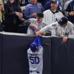 world-series:-mlb-reportedly-asks-yankees-to-ban-fans-who-grabbed-mookie-betts-during-game-4