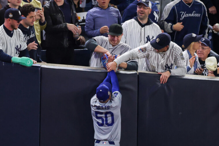 world-series:-mlb-reportedly-asks-yankees-to-ban-fans-who-grabbed-mookie-betts-during-game-4