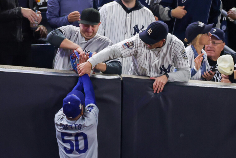 watch:-yankees-fans-pry-ball-from-mookie-betts’-glove-during-game-4-of-world-series