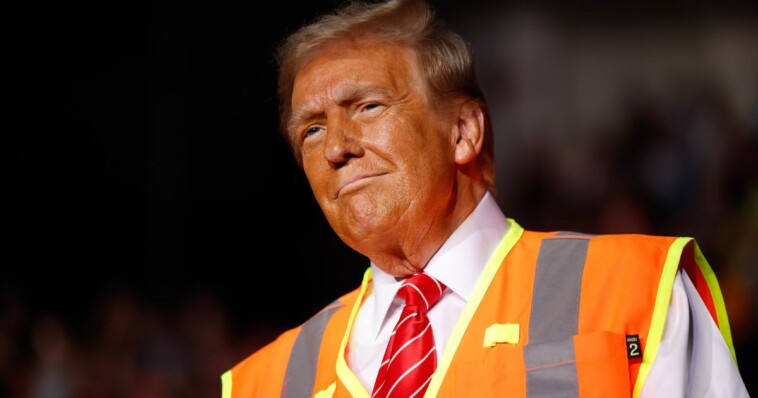 watch:-trump-has-rally-crowd-in-stitches-as-he-explains-how-he-ended-up-wearing-a-hi-vis-vest-on-stage