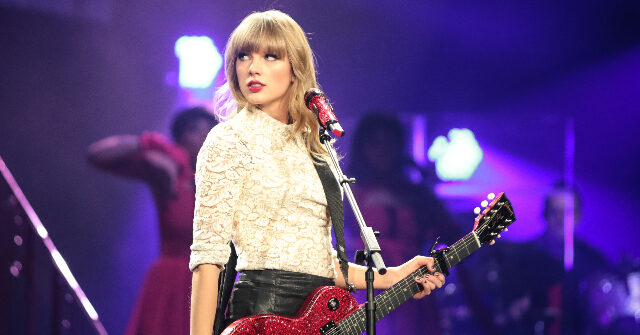 watch:-man-in-texas-wins-guitar-signed-by-taylor-swift-at-charity-auction,-then-smashes-it-to-pieces