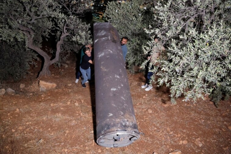 iran’s-missile-strike-on-israel-has-left-just-one-dead-so-far-—-a-palestinian-man-hit-by-shrapnel