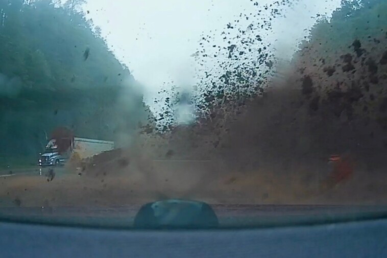 couple-narrowly-avoids-mudslide-triggered-by-hurricane-helene-on-north-carolina-highway:-wild-video