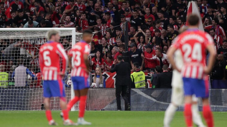 atletico-forced-to-close-stand-after-derby-fracas