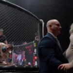 mma-fighter’s-wife-rushes-ring-begging-for-bout-to-be-stopped,-doesn’t-realize-her-husband-is-locking-in-the-finishing-move