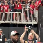 nfl-video-randomly-catches-falcons-fan-in-vicious-fight-after-game-winning-touchdown