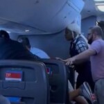 passengers-intervene-on-flight-when-man-allegedly-attacks-woman-next-to-him,-video-shows