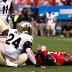 nc-state-quarterback-grayson-mccall-carted-off-the-field-after-scary-hit-sends-helmet-flying