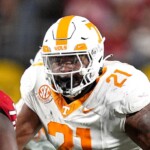 tennessee-player-shoves-fan-storming-field-to-the-ground-after-upset-loss-to-arkansas