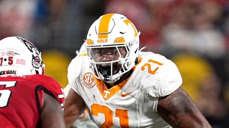 tennessee-player-shoves-fan-storming-field-to-the-ground-after-upset-loss-to-arkansas