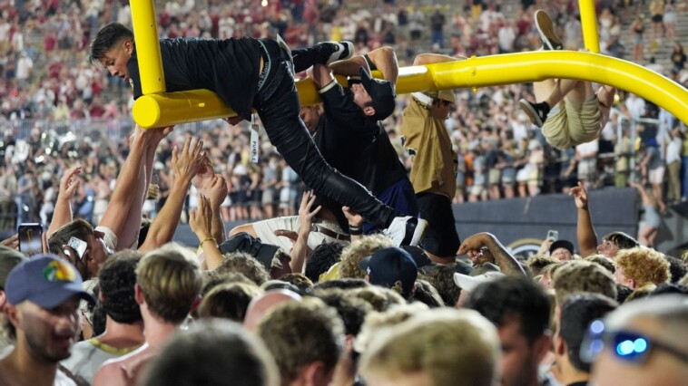 vanderbilt,-arkansas-fined-for-fans-storming-field