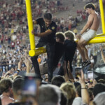 vanderbilt-and-arkansas-receive-six-figure-fines-after-fans-storm-the-field-in-upset-wins