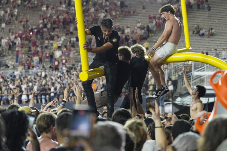 vanderbilt-and-arkansas-receive-six-figure-fines-after-fans-storm-the-field-in-upset-wins