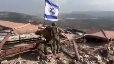 idf-soldiers-raise-israeli-flag-in-lebanon-during-ongoing-assault-against-hezbollah-terrorists