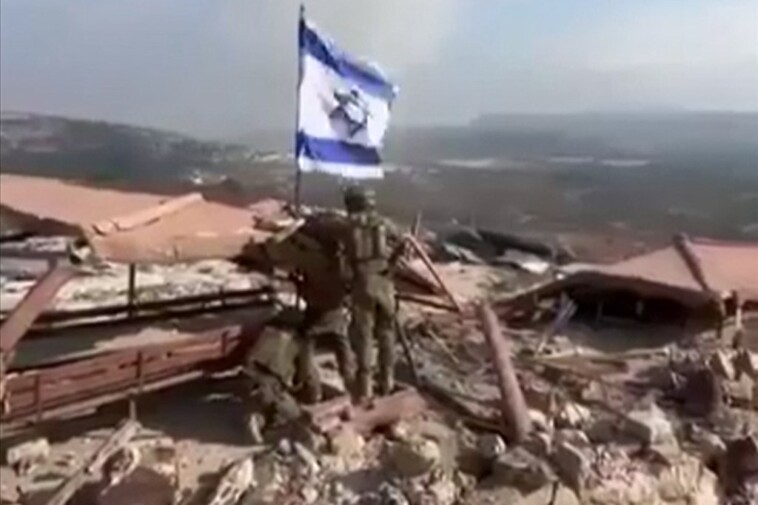 idf-soldiers-raise-israeli-flag-in-lebanon-during-ongoing-assault-against-hezbollah-terrorists