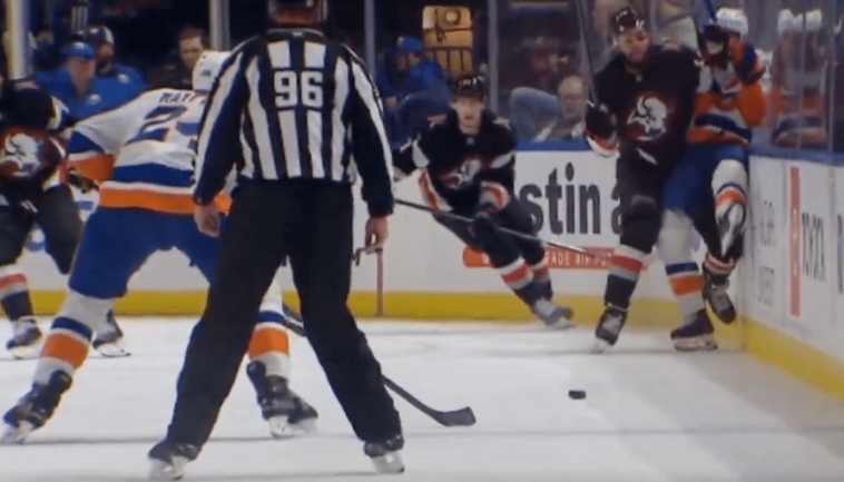 mike-reilly-leaves-ice-after-hard-hit-along-boards-in-islanders-injury-scare