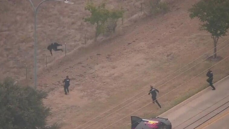 watch:-acrobatic-texas-fugitive-front-flips-over-fence-before-epic-take-down