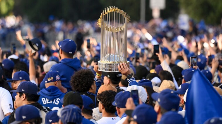 chaos-in-los-angeles-continues-as-dodgers-fan-falls-from-building-during-world-series-parade:-reports